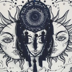 Dark blue dream catcher with beads and tassels